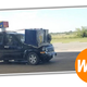 Illustration for article titled Local Moron Straps Washing Machine to SUV Hood Instead of Perfectly Good Roof Rack